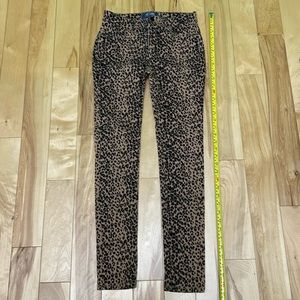 Girls size 14 tan/ black cheetah print pocketed pants, Never worn